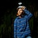 A young boy trains his headlamp on an object that fascinates him